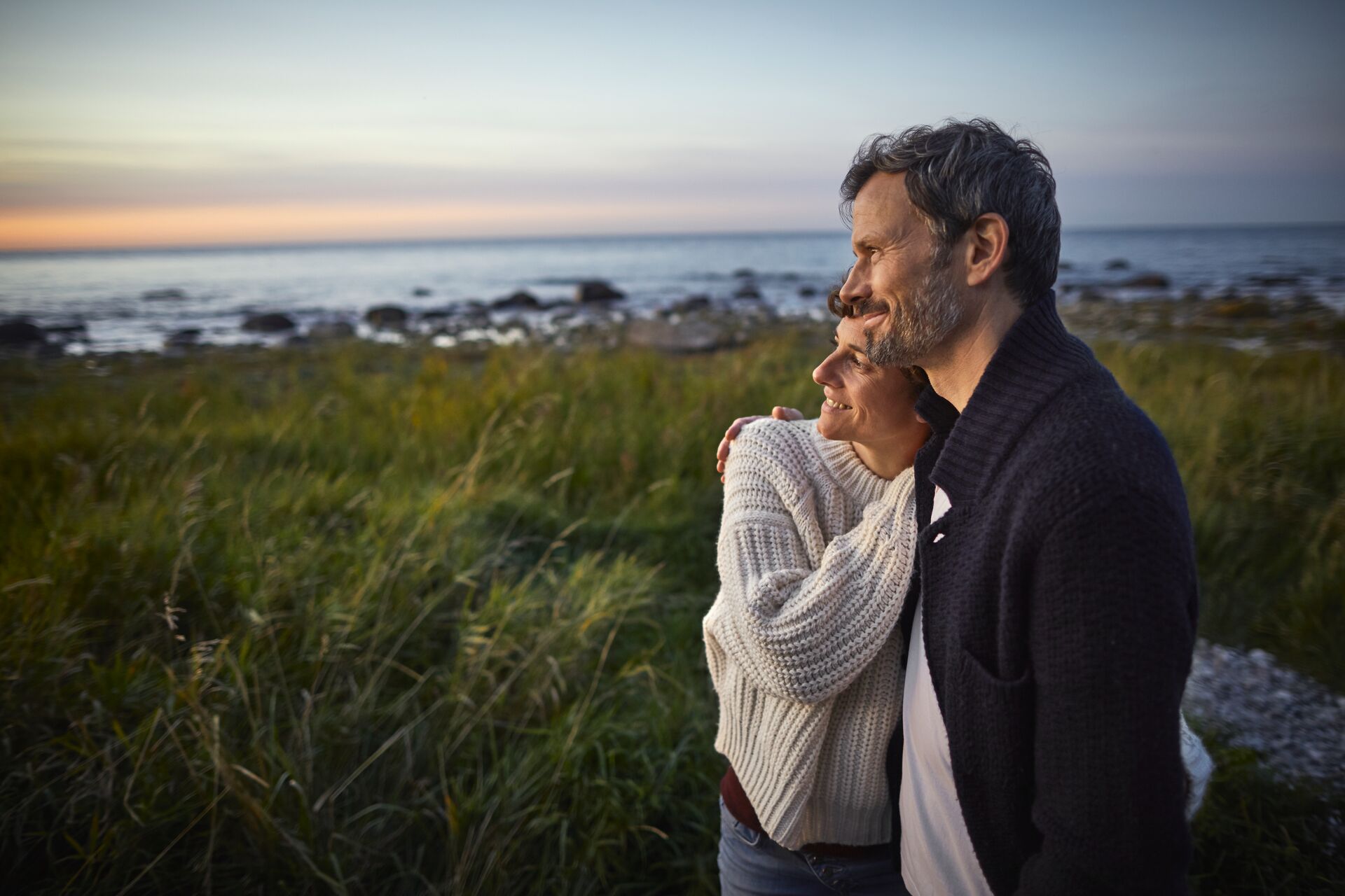 Couple looking at view at the sea