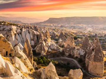 Fairy chimneys and rock formations at sunrise in Göreme, Cappadocia