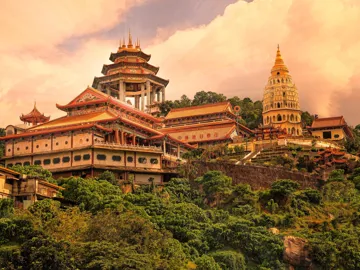 Vibrant ancient temple under the afternoon sun in Penang, Malaysia