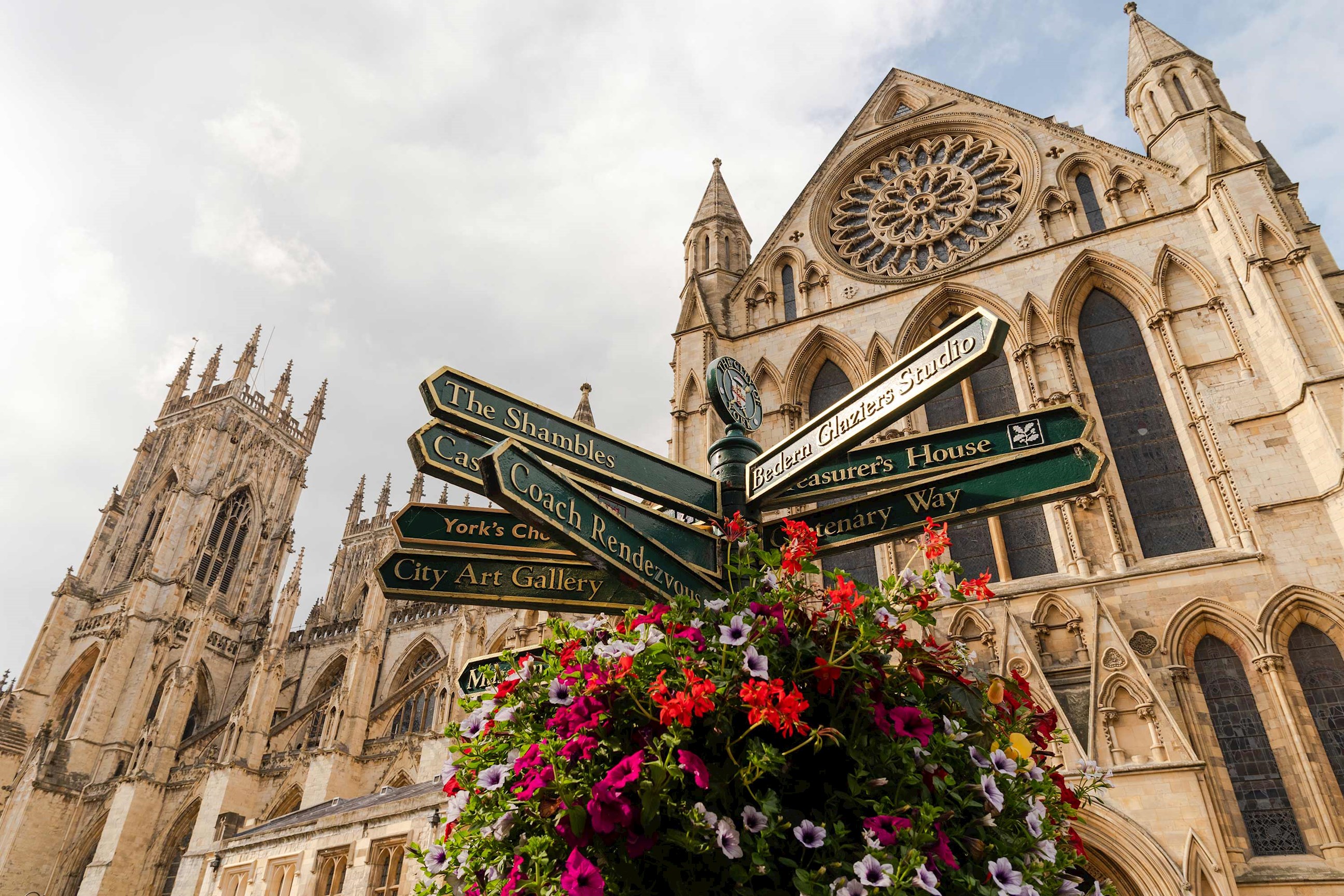 A close view of a cathedral  and flowers in Alnwick York, England