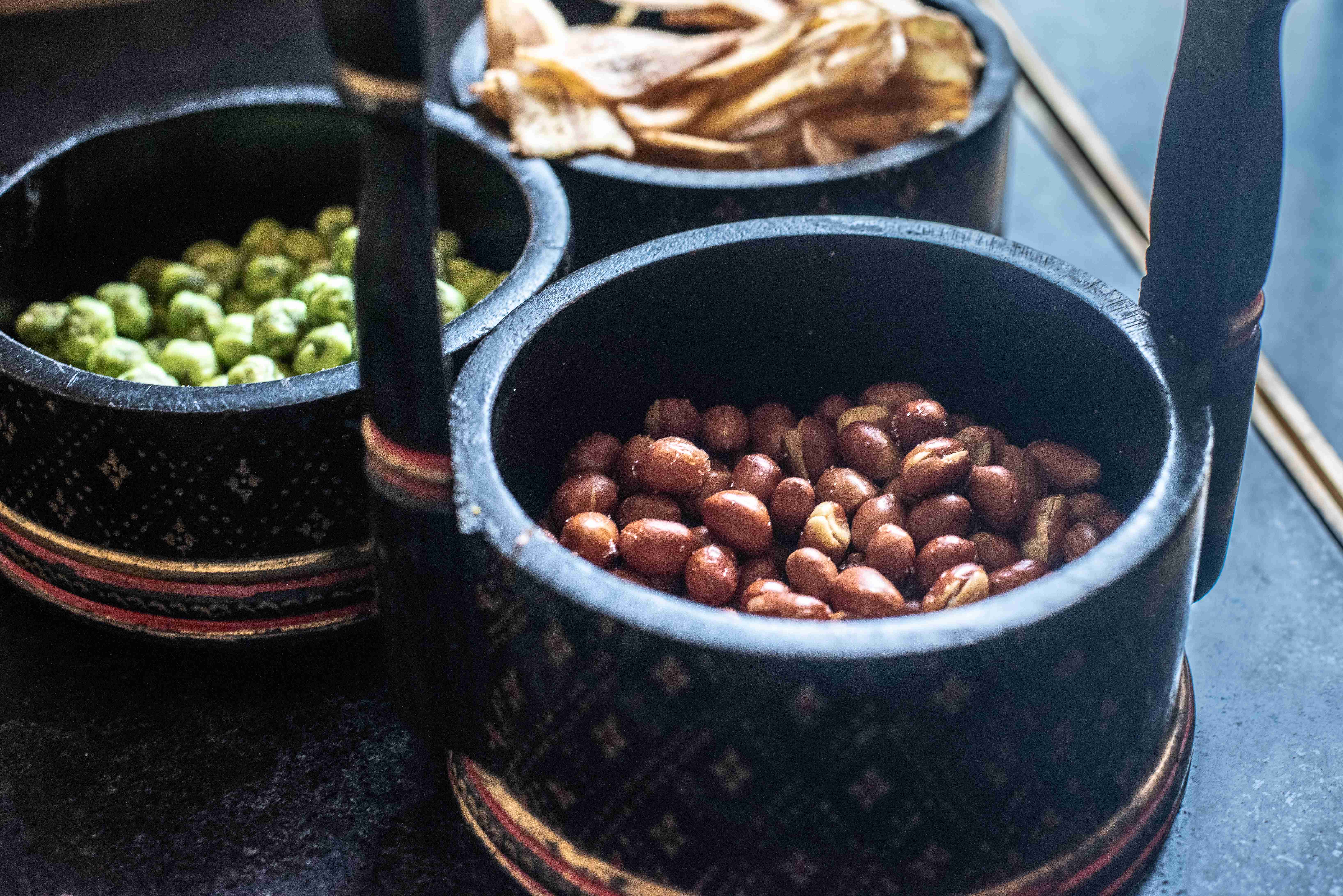 Ornate barrels of dried fruit and nuts, staples of the food in Cambodia