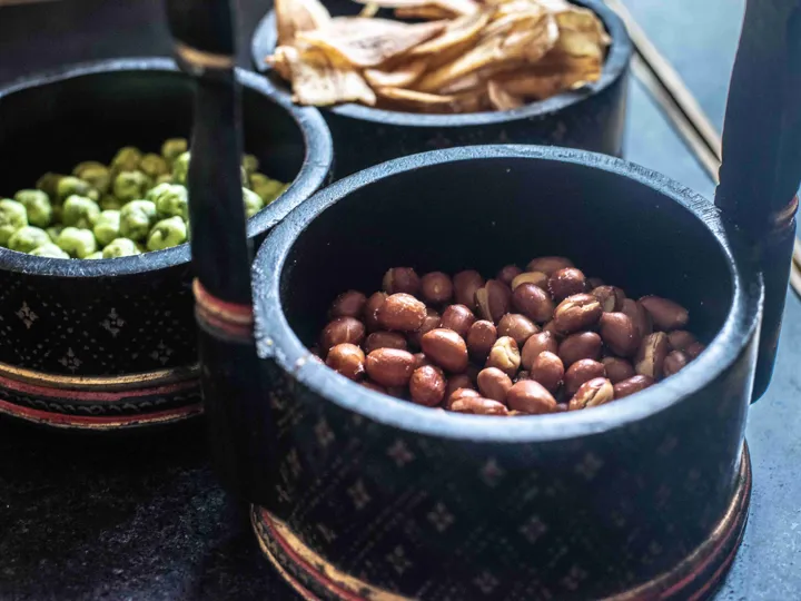 Ornate barrels of dried fruit and nuts, staples of the food in Cambodia
