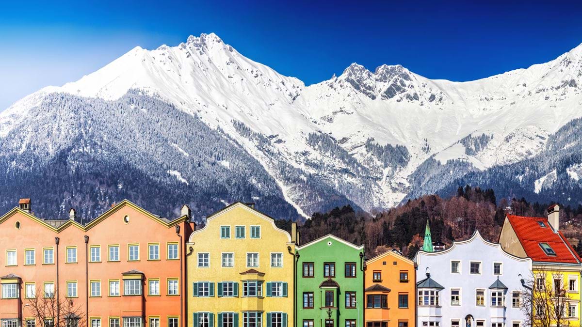 View of houses in front of Innsbruck Mountains in Austria