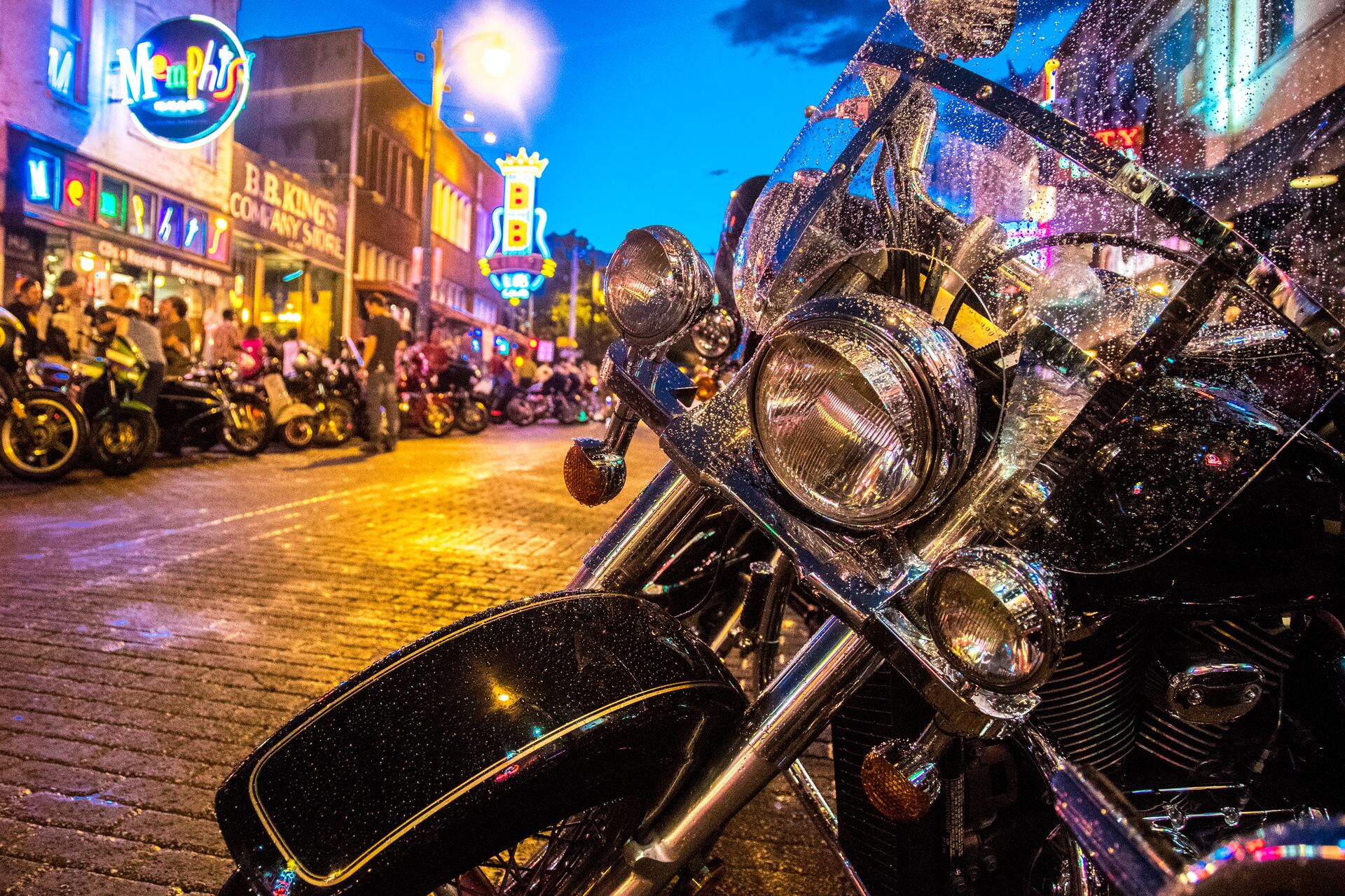 Bike on a night street with neons
