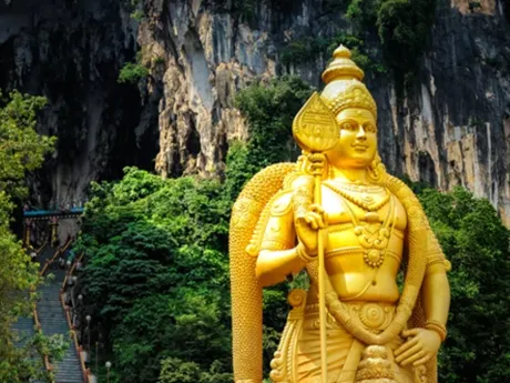 Huge golden statue at Batu caves in Kuala Lumpur, Malaysia