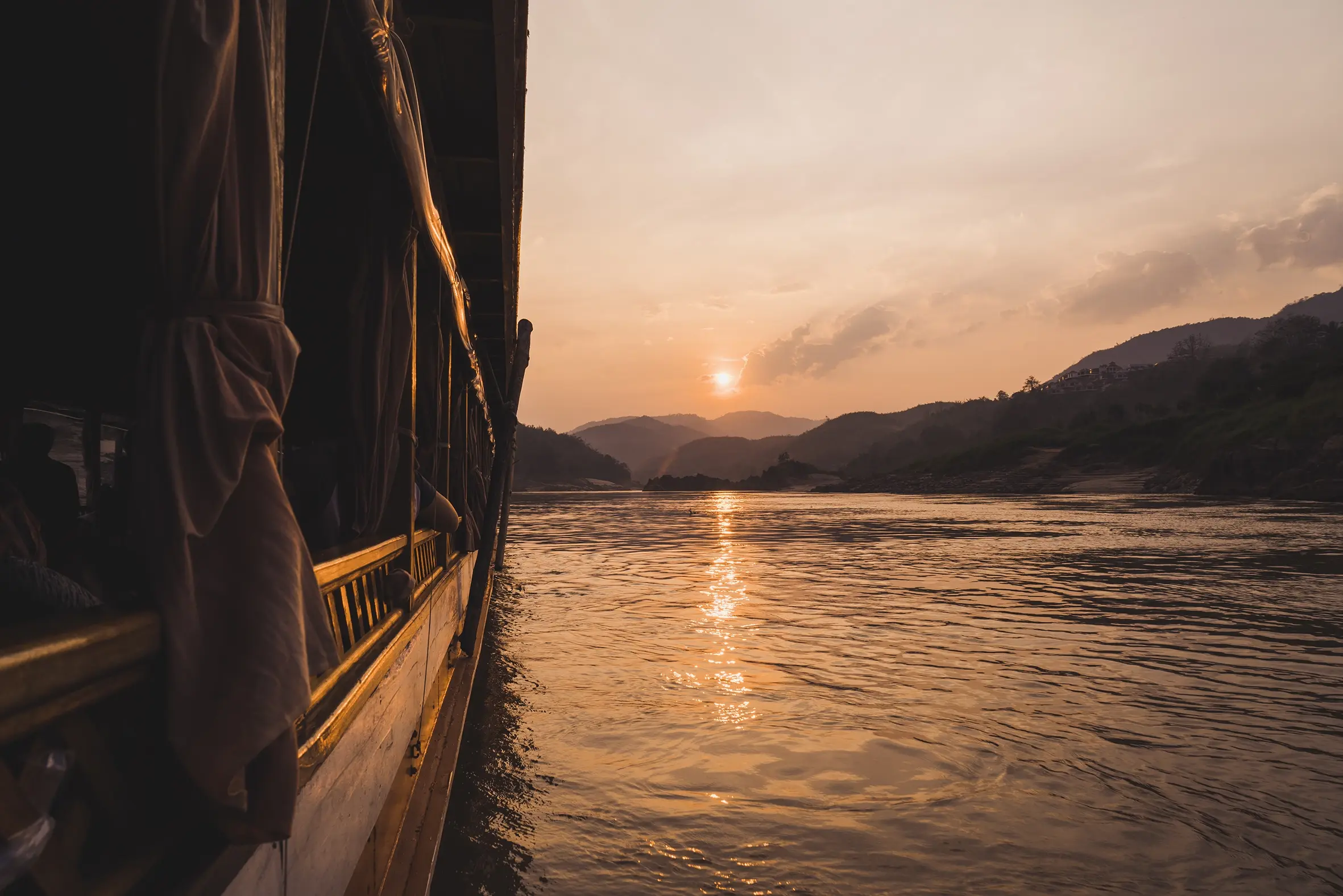 mekong-delta-river-boat-laos.webp