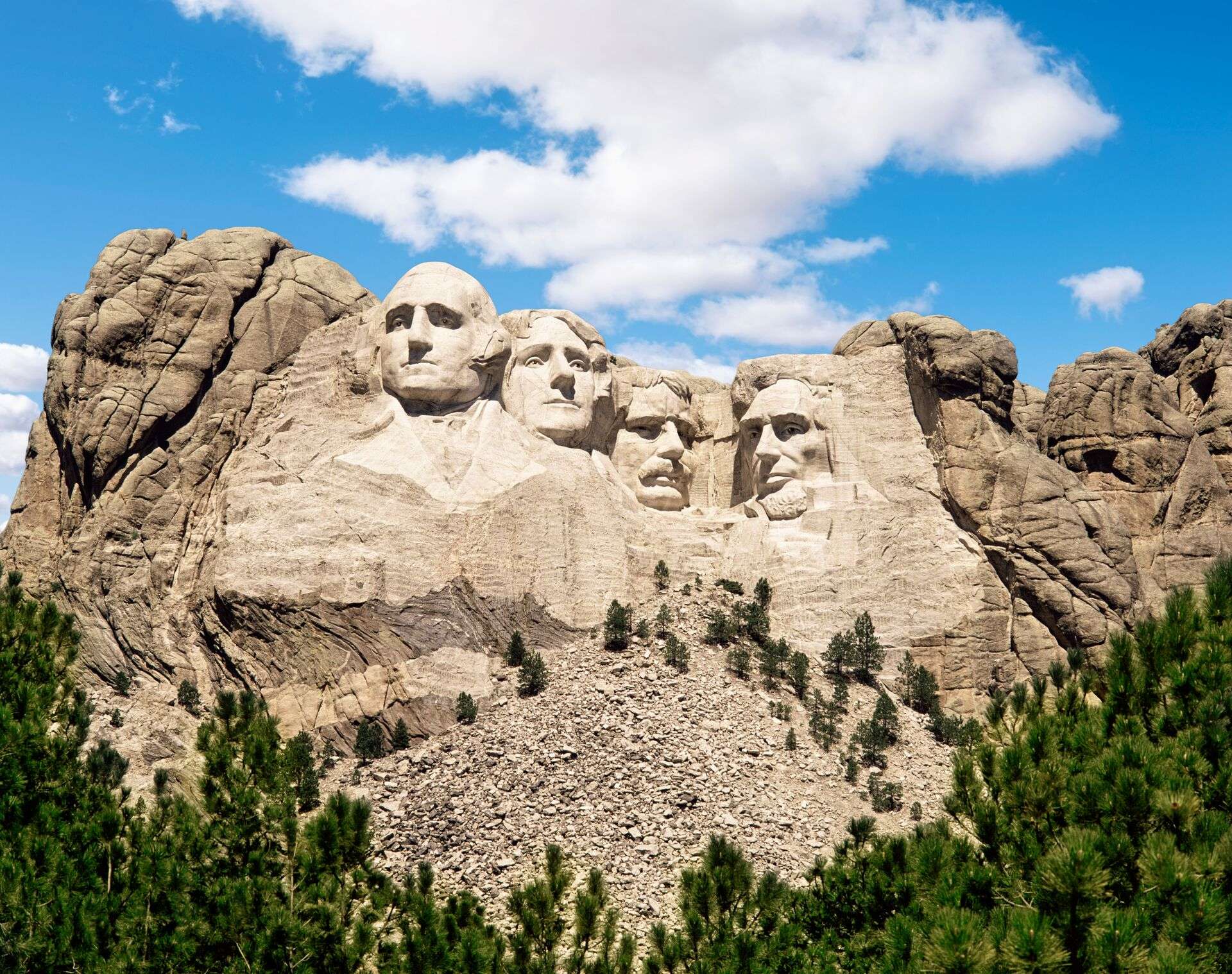 Mount Rushmore Monument under blue sky in South Dakota, United States
