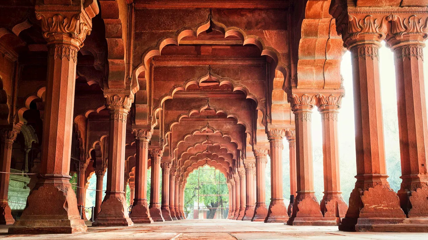 Diwan-i-Am hall at Red Fort with rows of ornate red sandstone arches