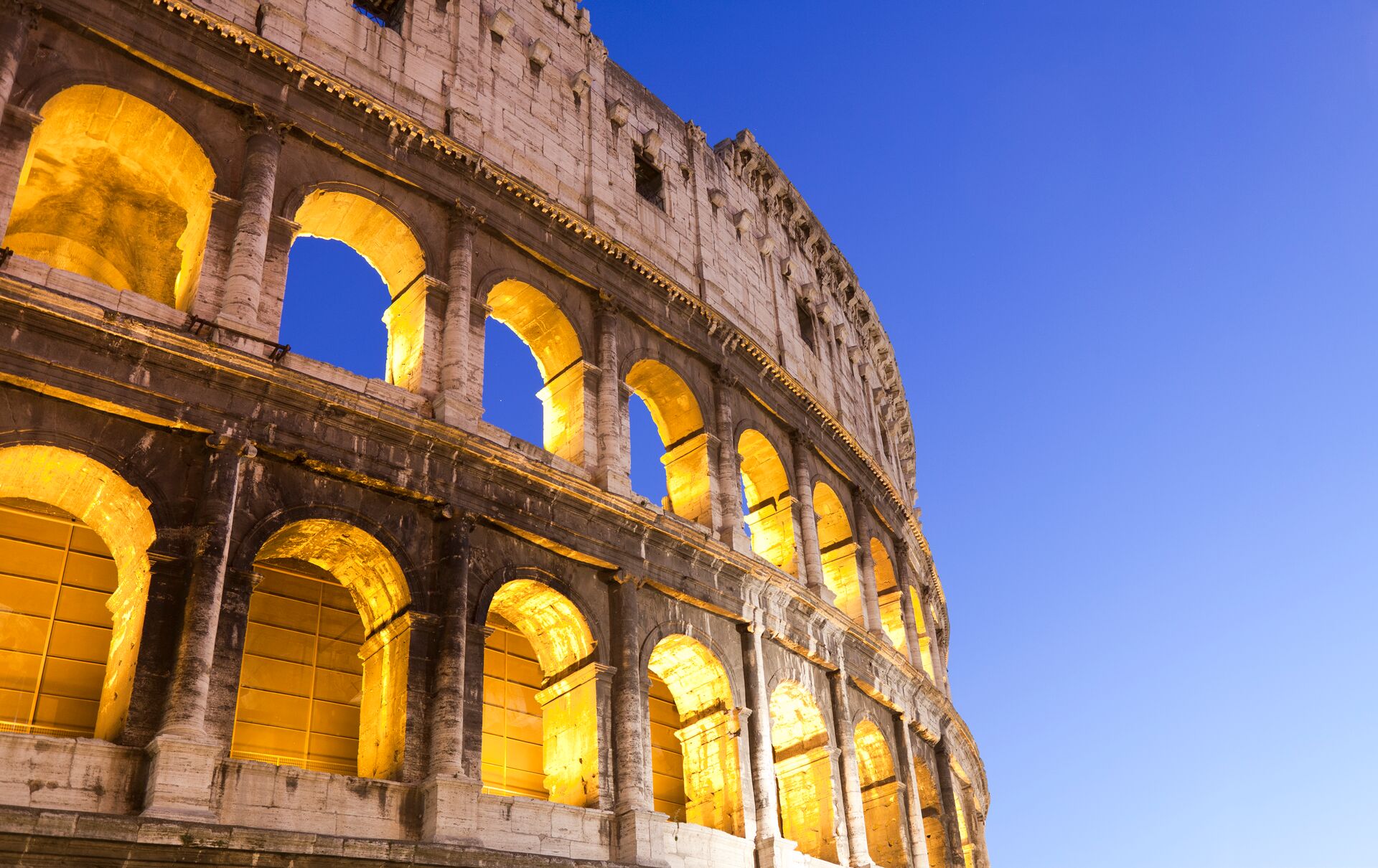 Abstract image of the Colosseum at night in Rome