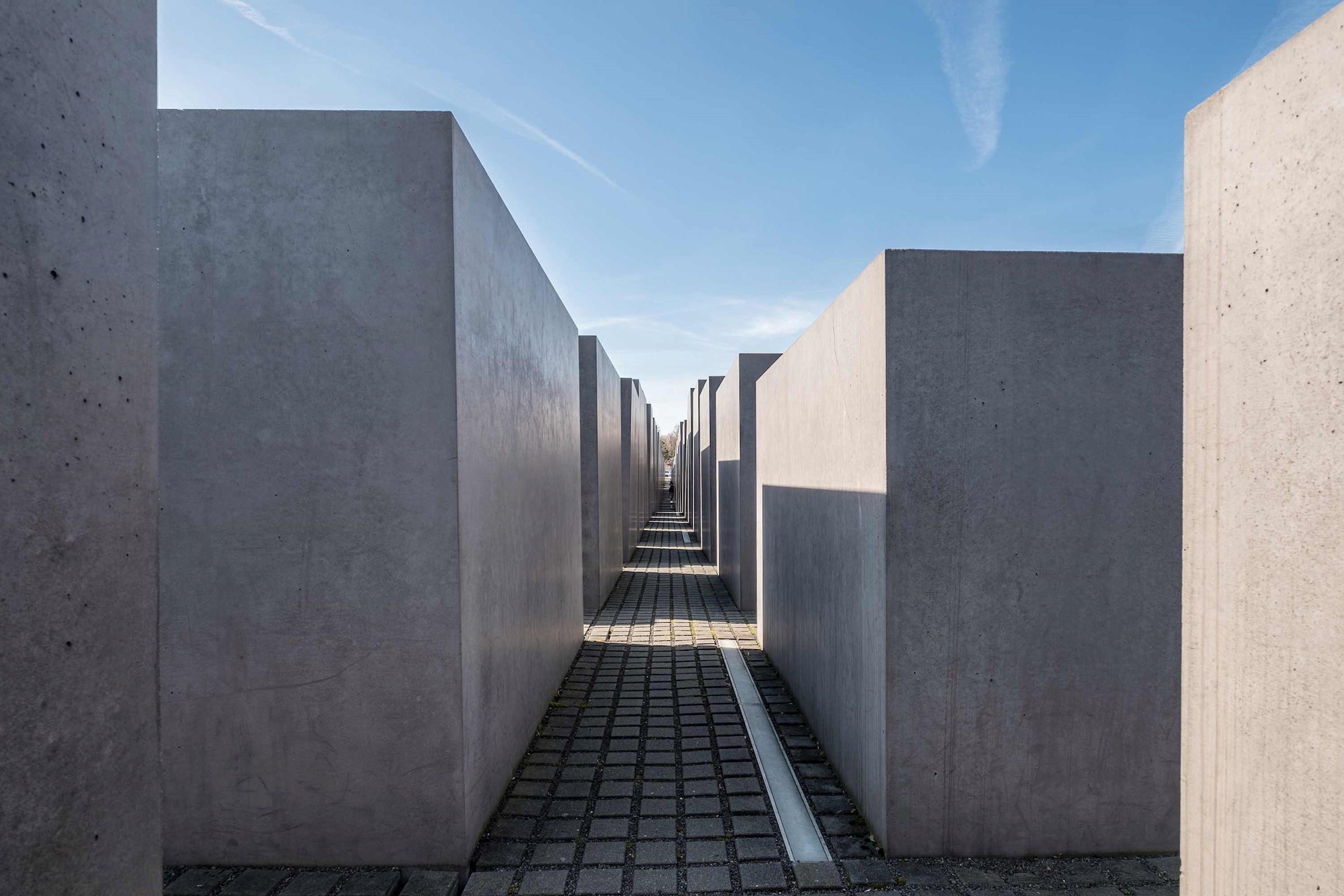 Berlin Holocaust Memorial concrete blocks with shadows in Germany