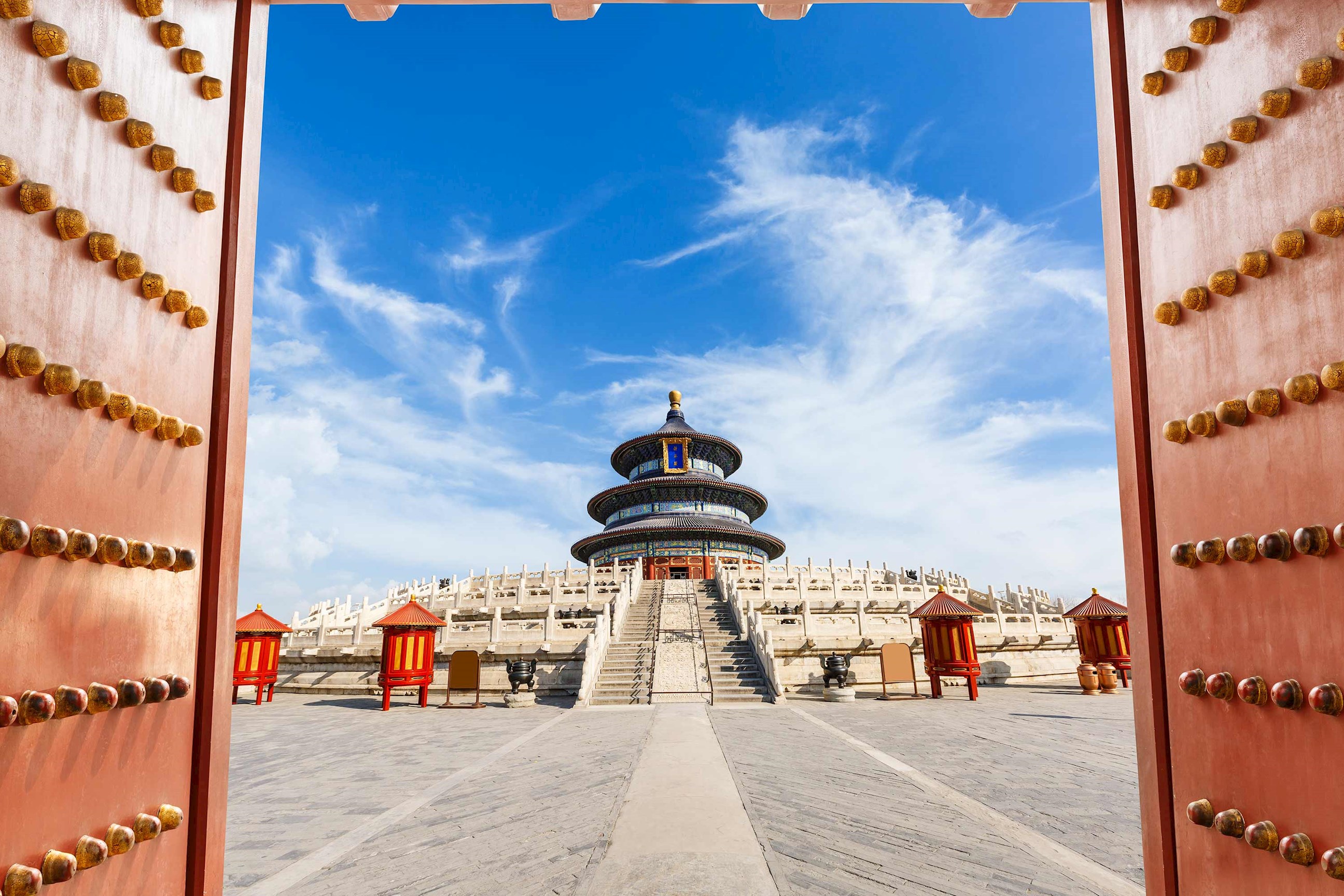 Temple of Heaven framed by open red gates in Beijing, China