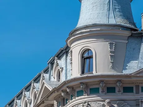 Latvia Art Nouveau Buildings with white walls, windows and blue roof