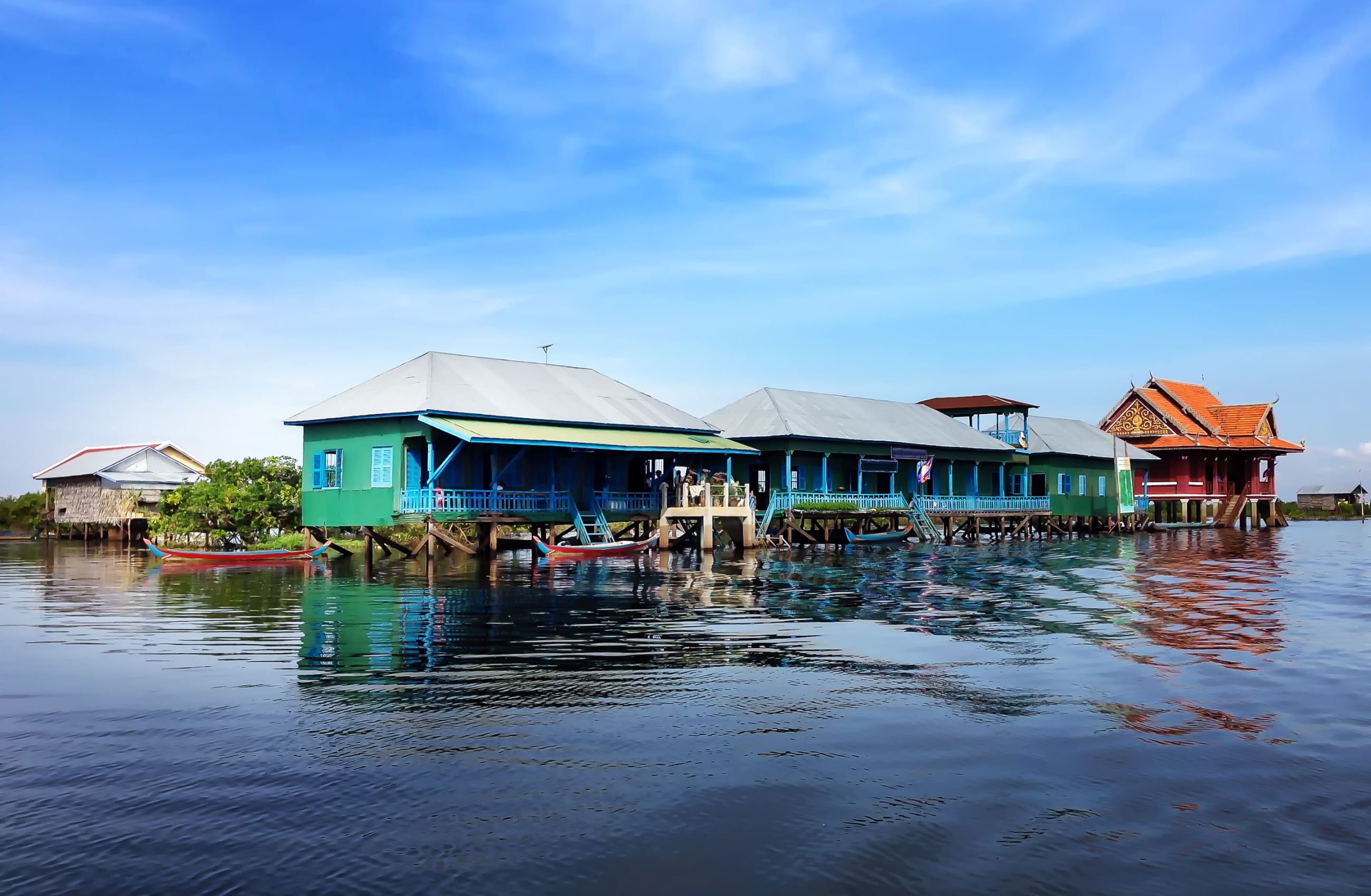 Buildings on stilts over water on Tonle Sap Lake in Cambodia.