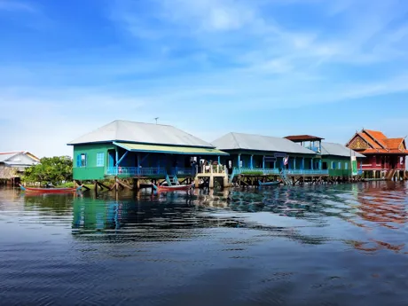 Buildings on stilts over water on Tonle Sap Lake in Cambodia.