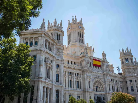 Palacio De Cibeles, with Spain flag, in Madrid