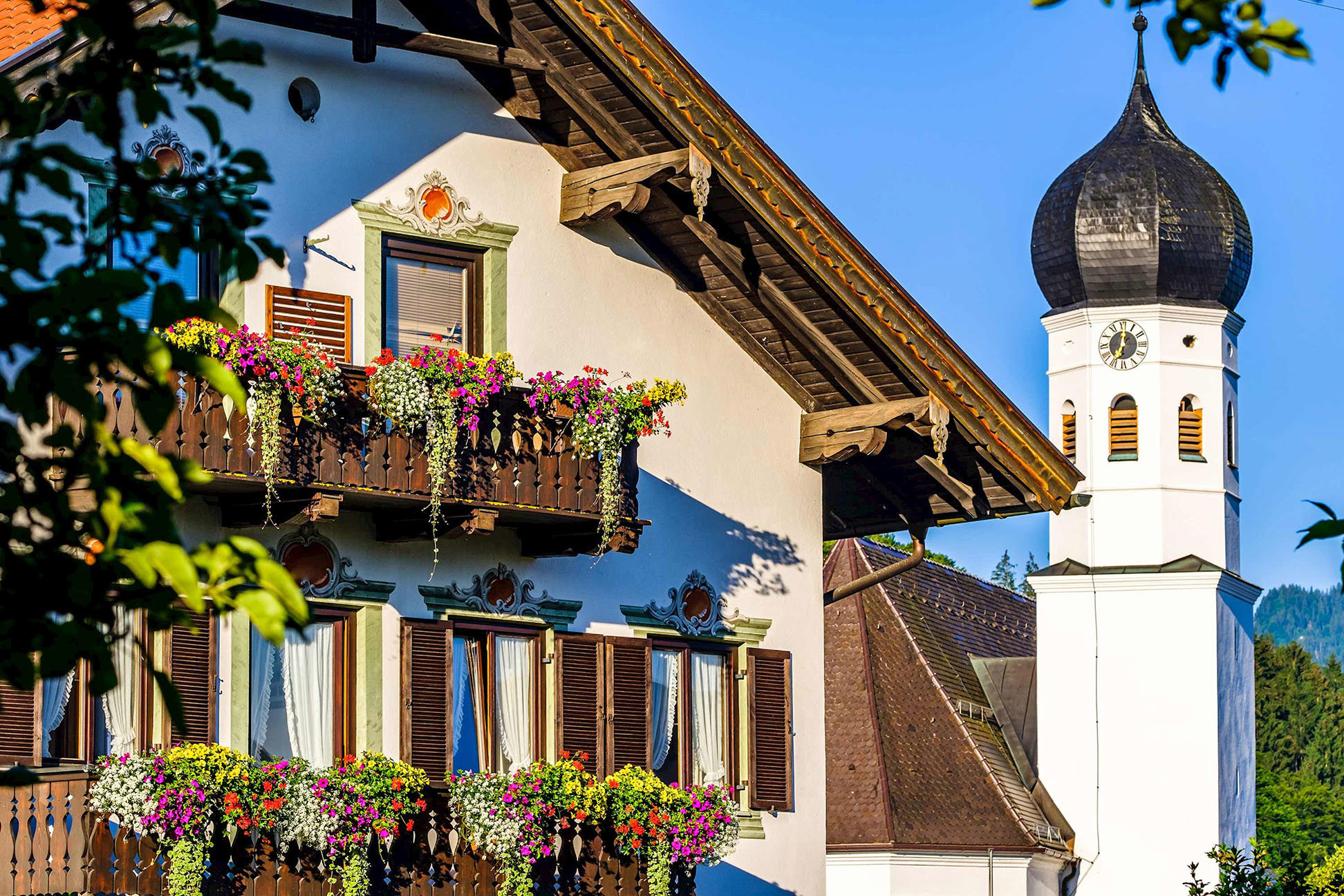 Bavarian house with flowered balconies in Bavaria, Germany