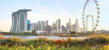 Panorama of Singapore Bay Gardens with city skyline in the background