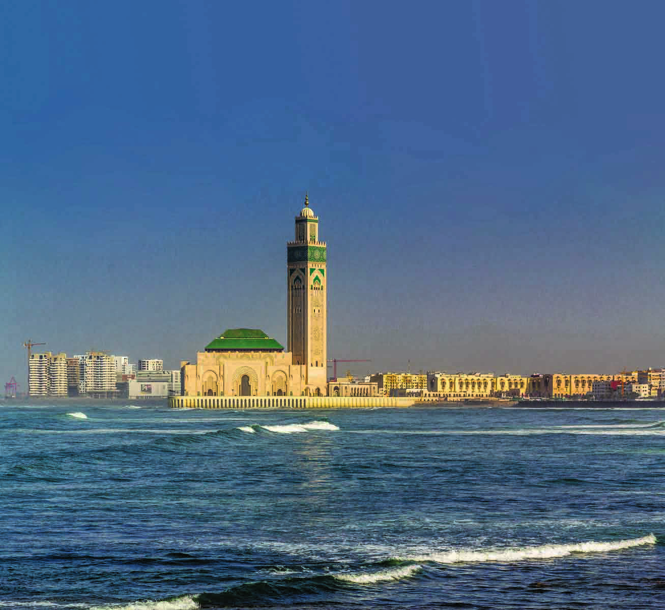 Hassan II Mosque overlooking the Atlantic Ocean waves in Casablanca, Morocco