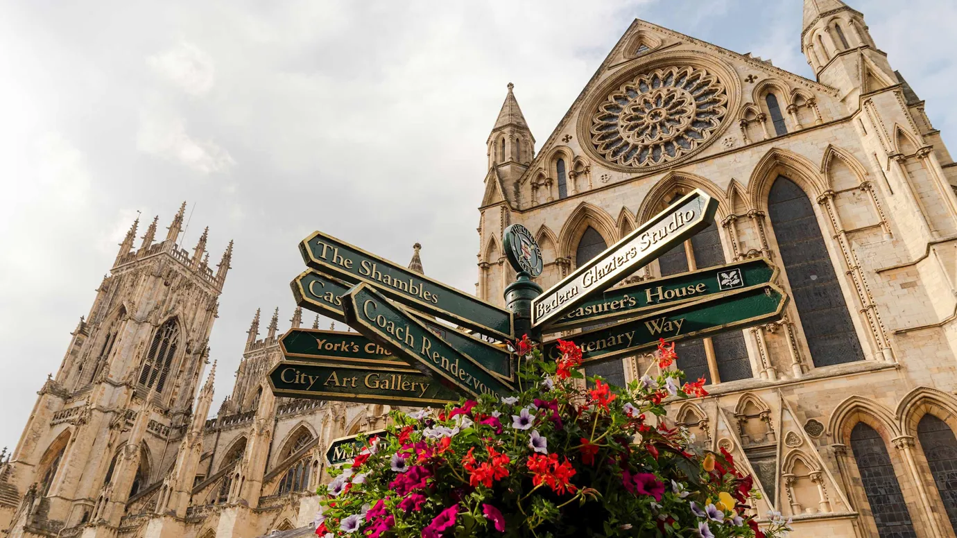 A close view of a cathedral and flowers in Alnwick York, England