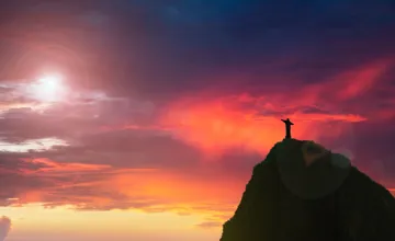 Statue Of Christ The Redeemer On The Corcovado at dusk in Rio de Janeiro, Brazil