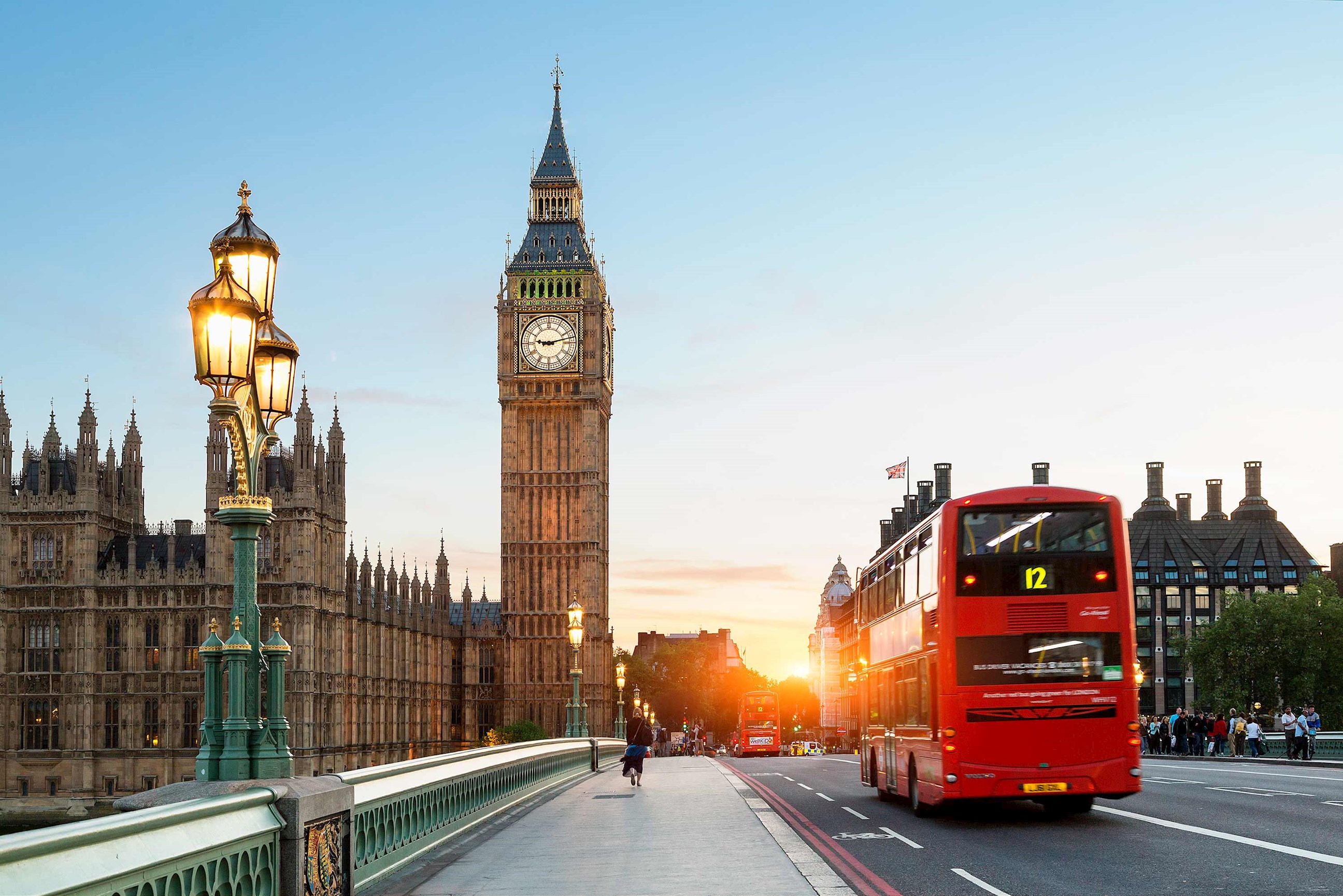Big Ben and Westminster Bridge with iconic red London bus