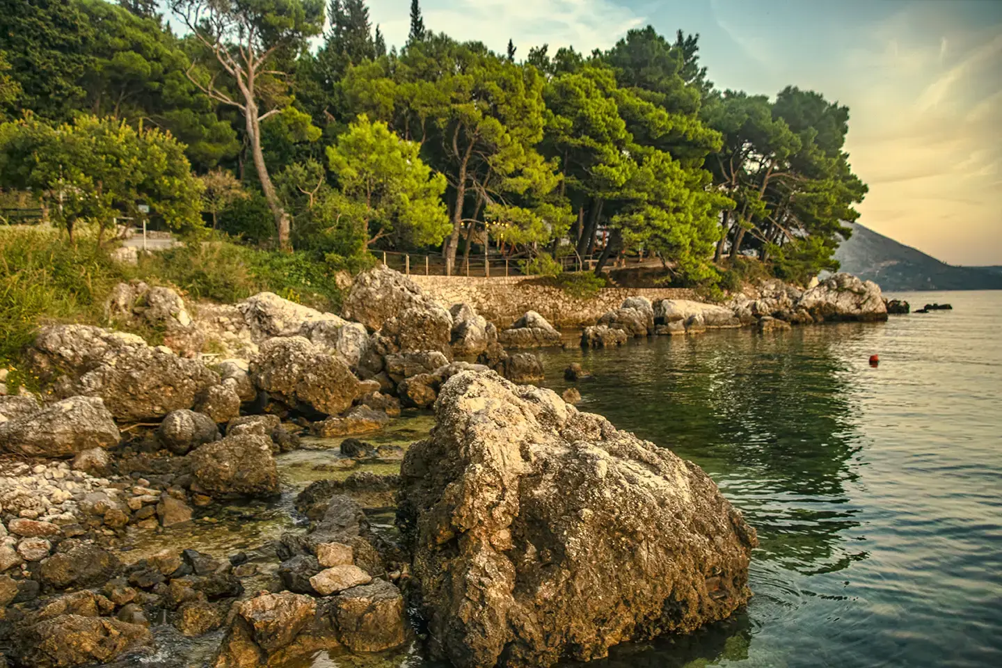 a-beautiful-rocky-cove-by-the-coastal-path-at-mlini-near-dubrovnik-croatia-1154602112.webp