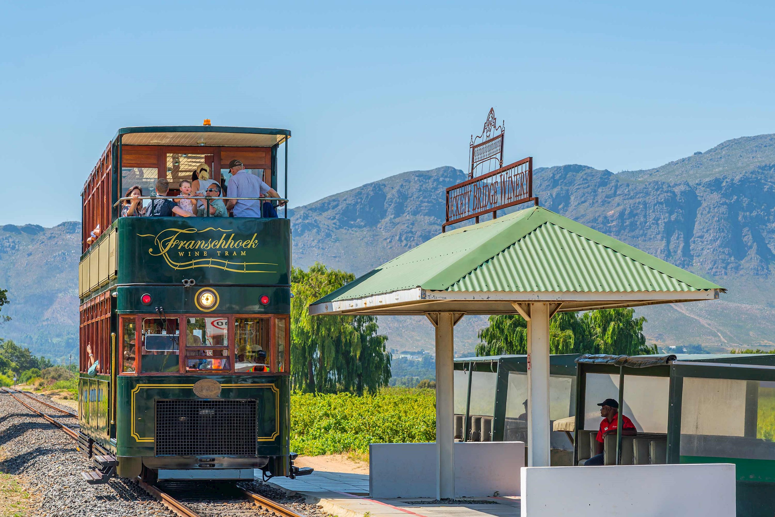 explore-wine-estates-onboard-vintage-style-wine-tram-franschhoek-south-africa.jpg
