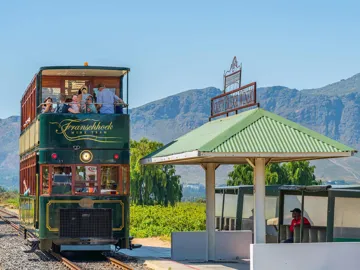 explore-wine-estates-onboard-vintage-style-wine-tram-franschhoek-south-africa.jpg