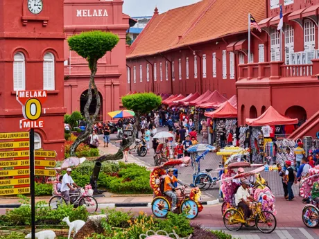 Colourful bikes in Crowded Malacca Street Malaysia