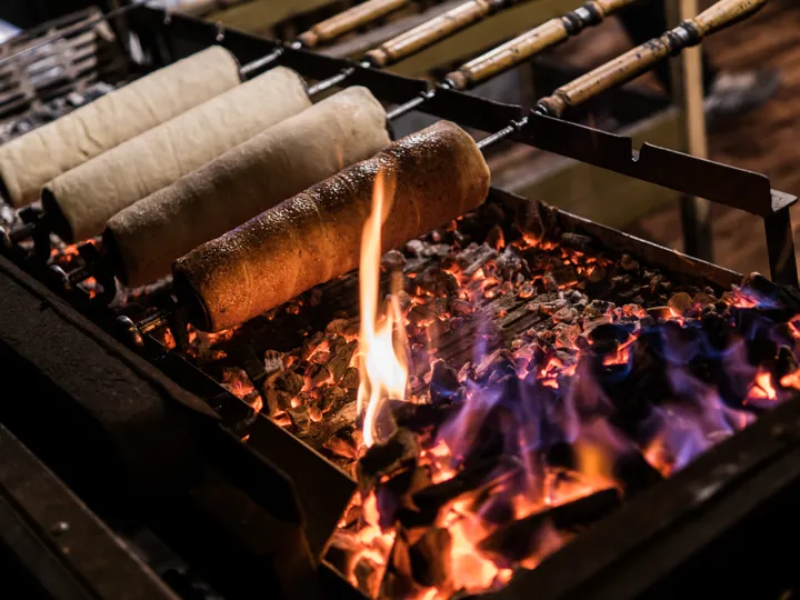 Kurtos Chimney Cake burning on the fire in Hungary