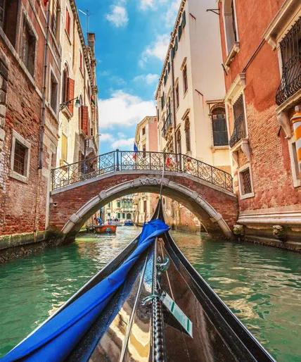 POV shot from within a Gondola in Venice's Canals