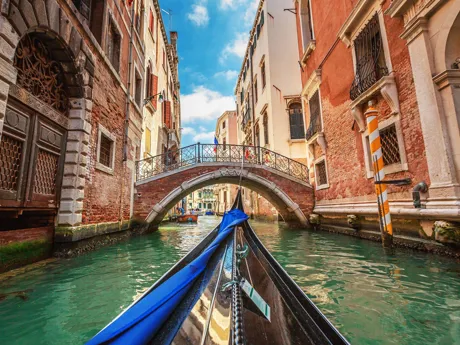 POV shot from within a Gondola in Venice's Canals