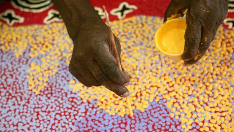 Aboriginal Artist Painting At Ngurratjuta Iltja Ntjarra Many Hands Art Centre
